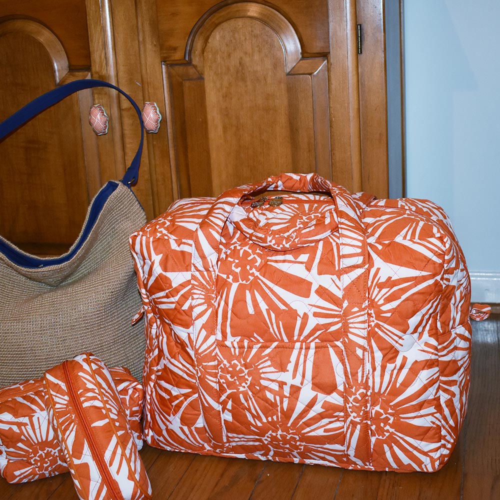 mosaic floral orange quilted duffle