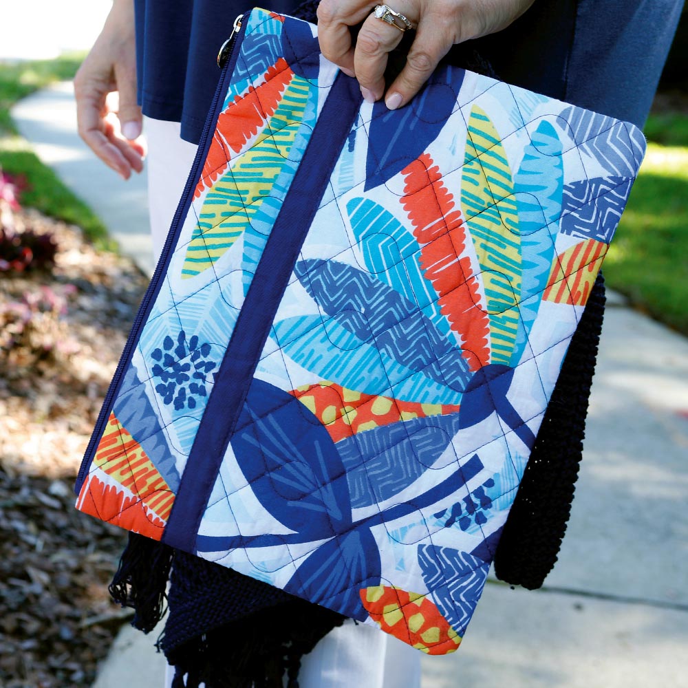 lei'd back quilted zipper bag