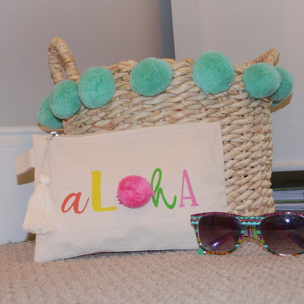 zipper bag printed aloha with pom